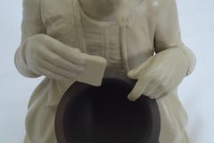 Reconstitution des mains sur un porte allumettes